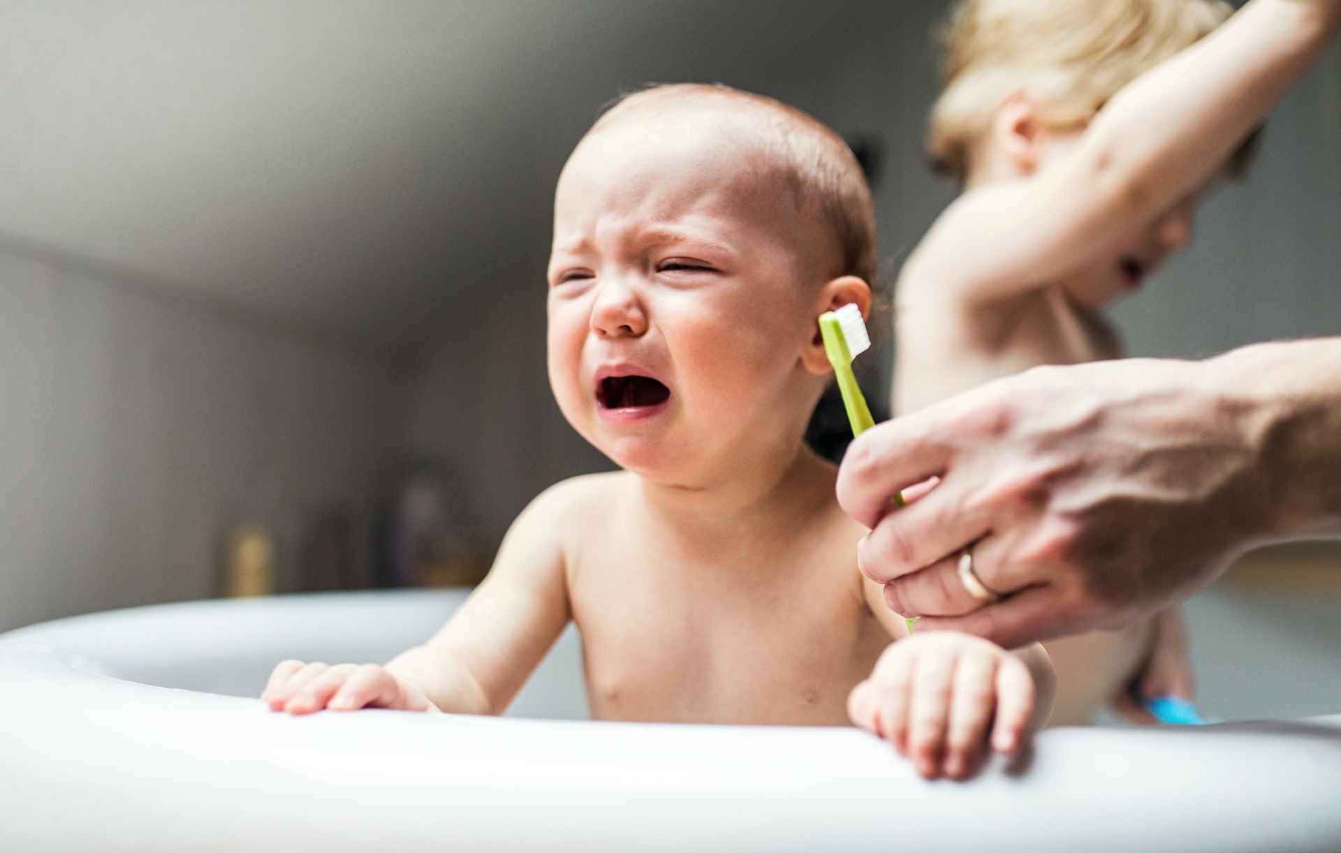 Brushing 8 month old 2024 teeth