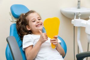 Little girl comfortable at dentist in Portland, Oregon